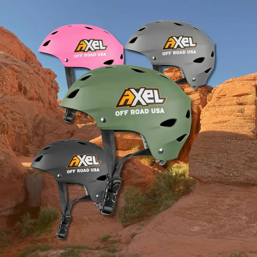 Four Axel off-road helmets in different colors against a desert background