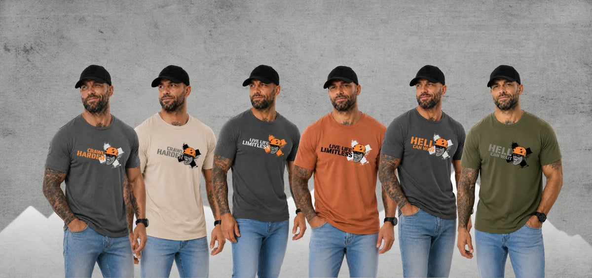 Six men standing side by side wearing graphic t-shirts in different colors (gray, beige, dark gray, orange, dark gray, olive green)