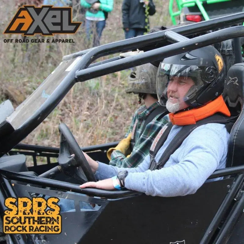 Axel Off Road Neck Brace being worn in a UTV